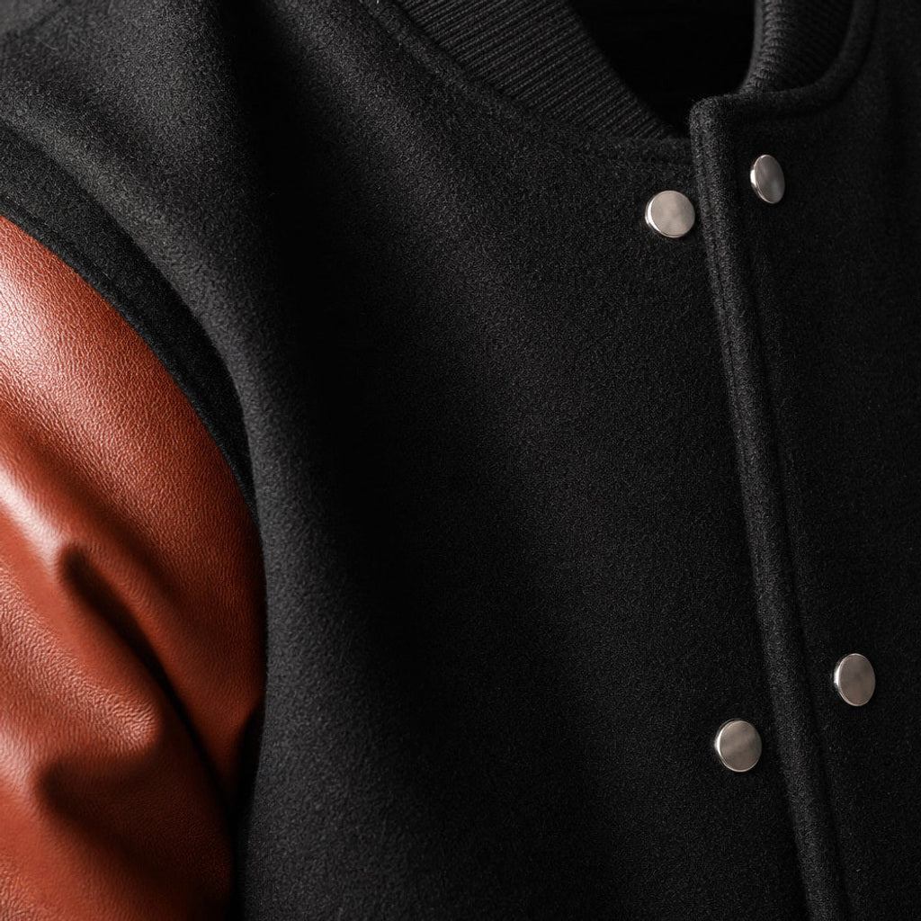 Theudemar | Collegejacke Wollkörper Lederärmel Schwarz – Stoff- und Detailaufnahme